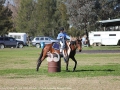 Olivia U-Reen from Muswellbrook Public School riding Peebles: picking up a jacket on a drum.