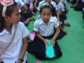 Children at the school in Un Long Thom Village received thongs and education materials.