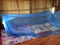 Mosquito nets donated to Chum Kiri village.