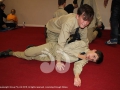 Adam Chesworth placing Ryan Cook in the recovery position.