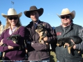 Jessie Plant, Adam Wroble andd Rob Parish with 9 week old pups by Glenfaba Kenny out of Glenfaba Catie.