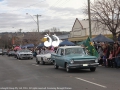 A procession of cars led by an EH Holden 'special' sedan bought in a mainly restored condition in Melbourne in 2011. Following is also a 1967 Morris MGB Roadster and 2006 Ford Mustang GT Convertible.