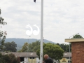 John Brooks attending to the flag during the Scone service.