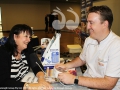 Dianne Pittard having her blood pressure taken by Ben Butters from Scone Discount Drug Store.