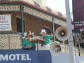 Sid and Des Collison on the roof of the Royal Hotel, commentating the parade.