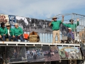 Brian Hunt managed to hang onto his hat as they went over a bump on the King of the Ranges float.