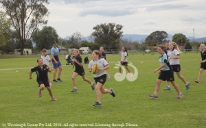 Hayleigh Anderson, Year 5 St Mary's running with the ball at the gala day in Scone.